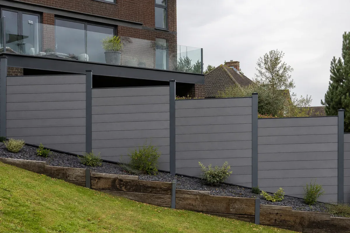 Composite fence panels on a sloping garden in Sandbach